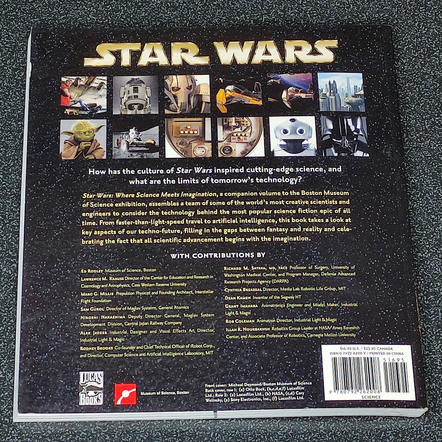 Back cover of a 'Star Wars' book with text and images on a dark textured surface
