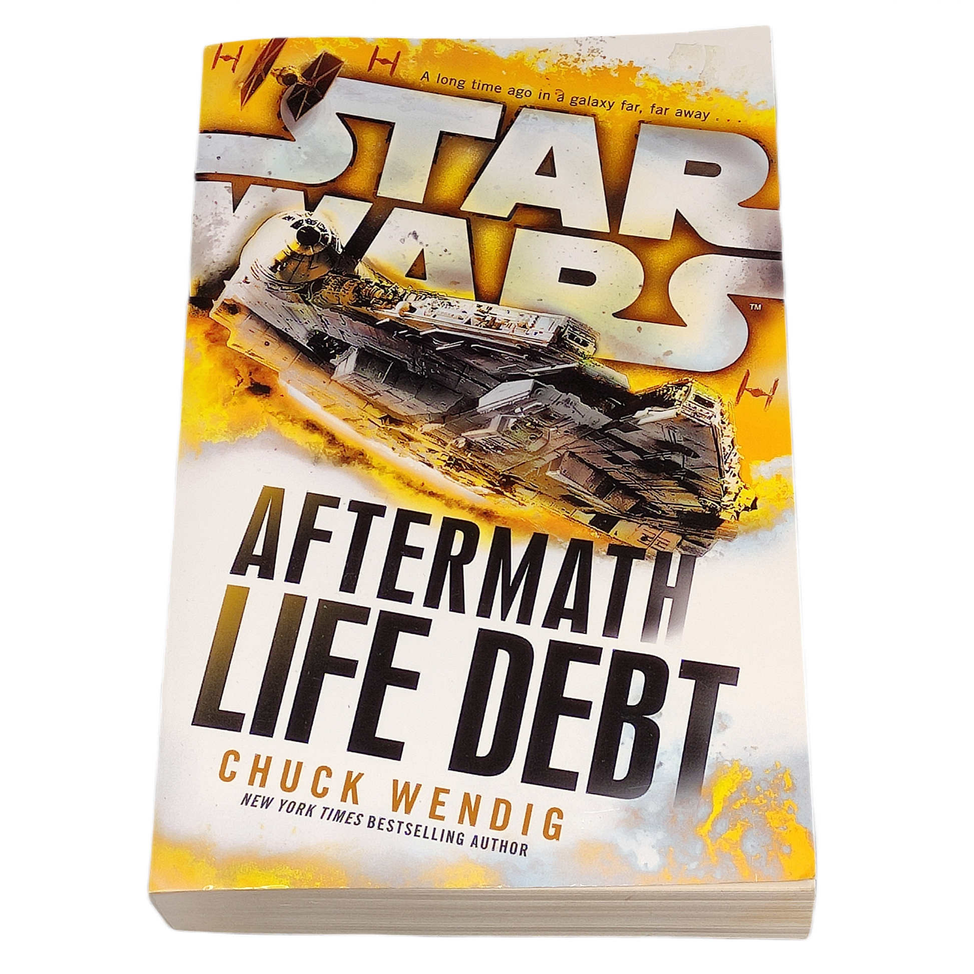 Book titled 'Aftermath: Life Debt' by Chuck Wendig with a Star Wars logo on the cover.