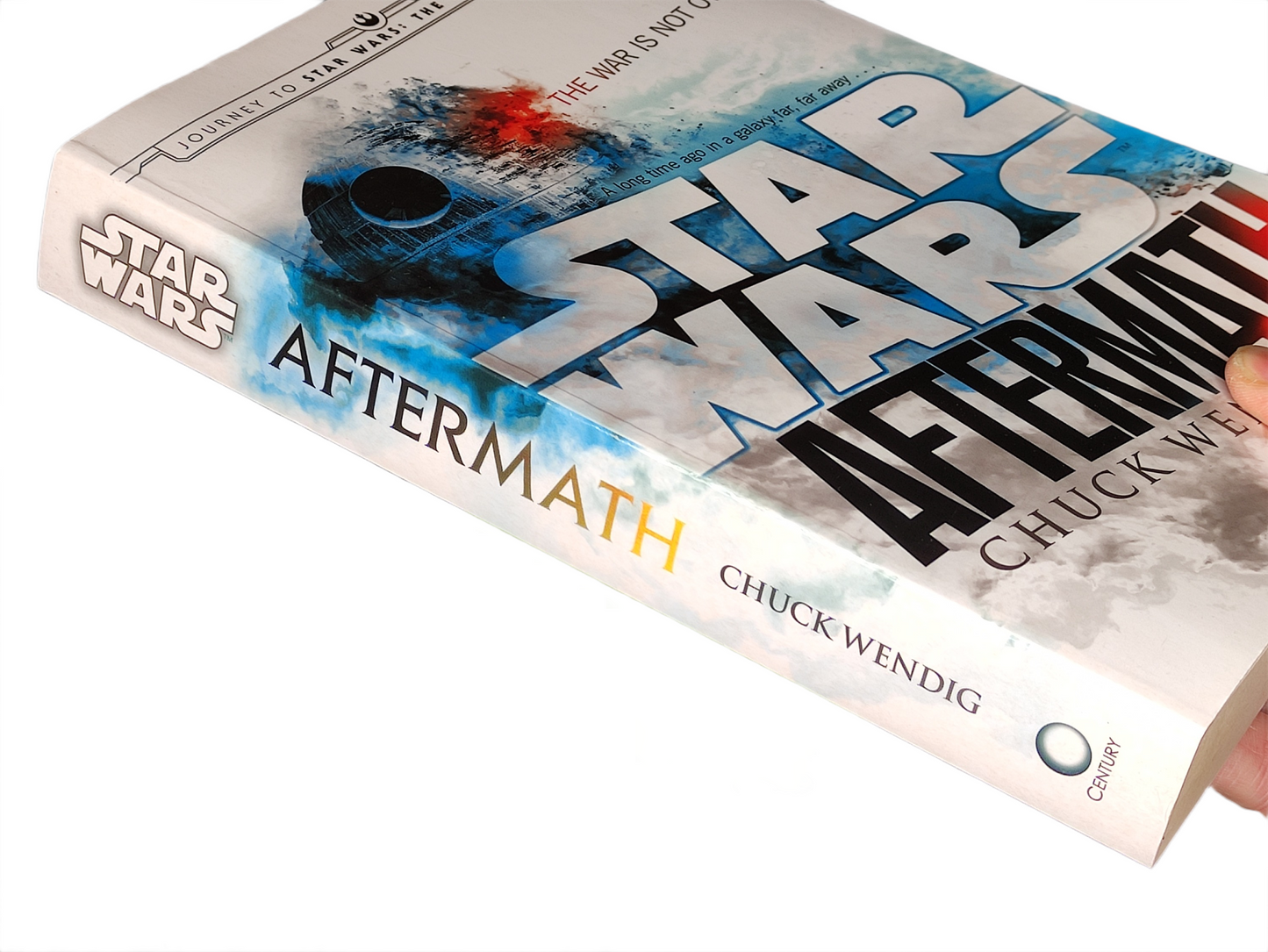 Book titled 'Aftermath' by Chuck Wendig with Star Wars branding on a white background