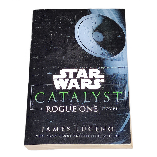Book titled 'Catalyst: A Rogue One Novel' by James Luceno with a Star Wars logo on a white background.