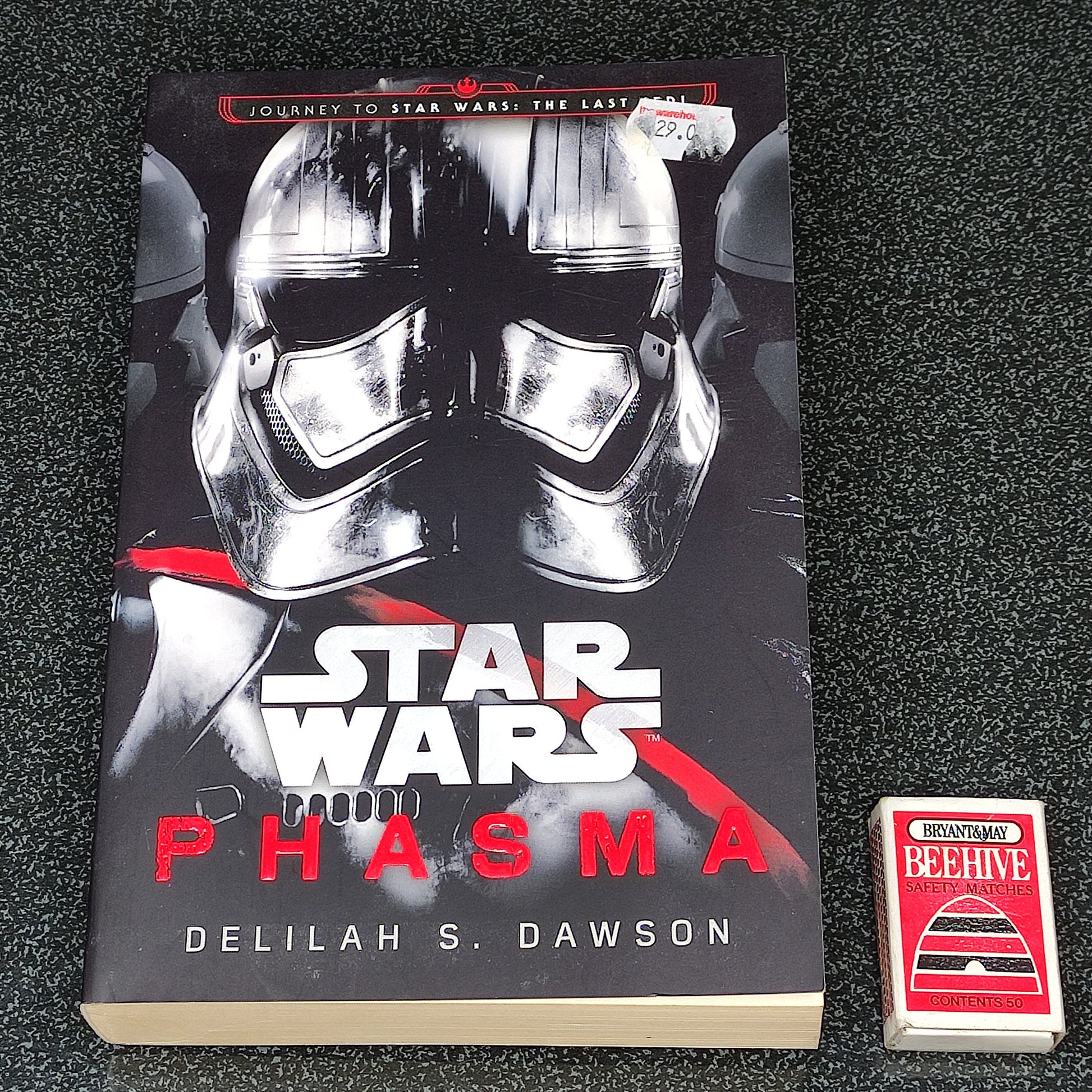 Book titled 'Star Wars: Phasma' by Delilah S. Dawson on a textured surface