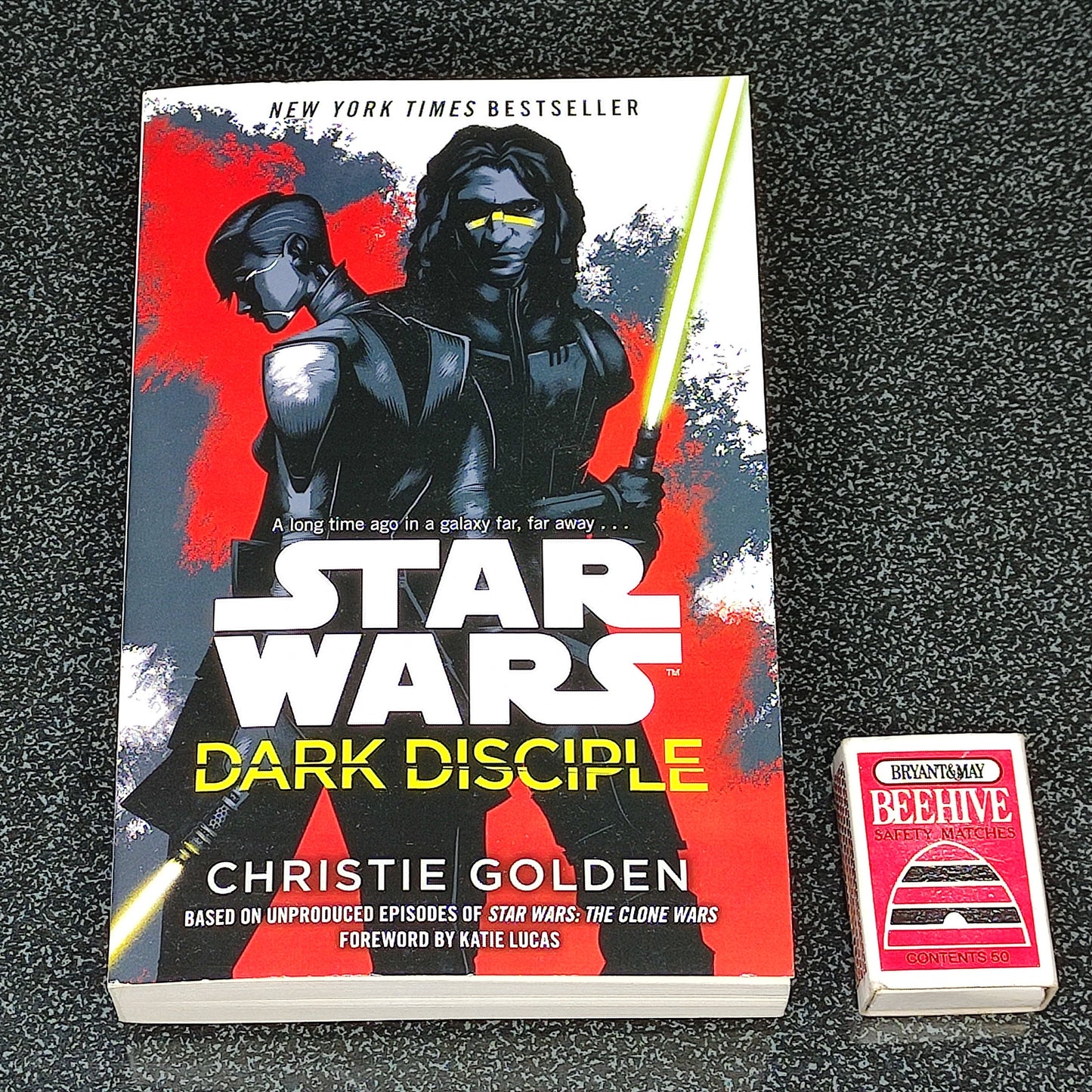 Book titled 'Star Wars: Dark Disciple' by Christie Golden on a textured surface