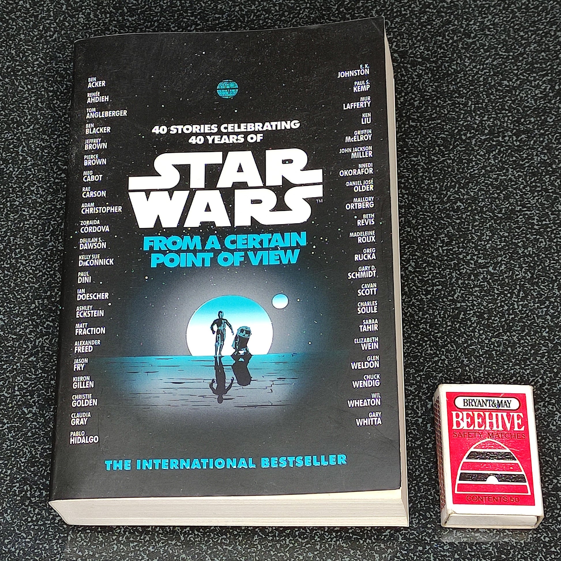 Book titled 'Star Wars: From a Certain Point of View' on a textured surface