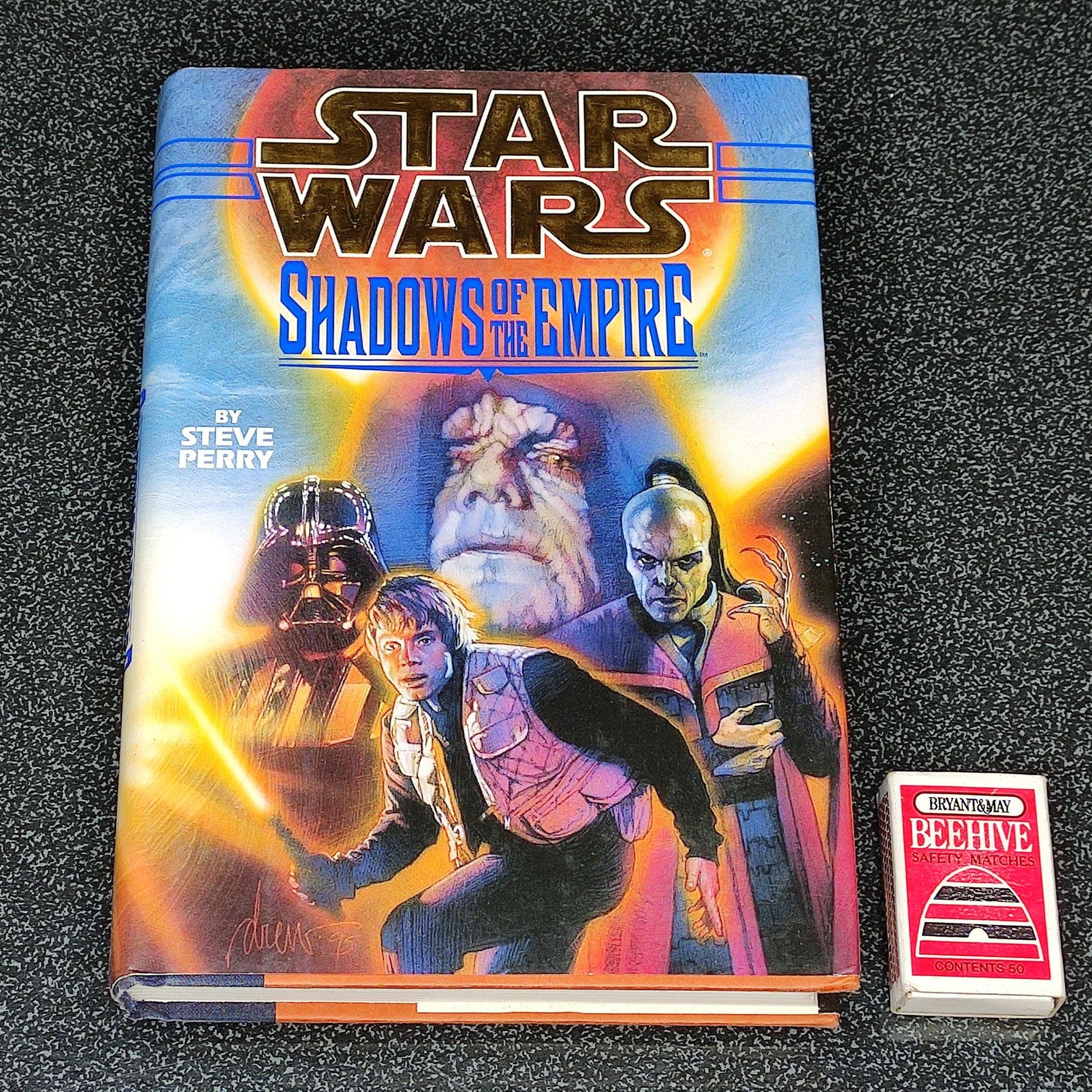 Star Wars 'Shadows of the Empire' book 
on a textured surface