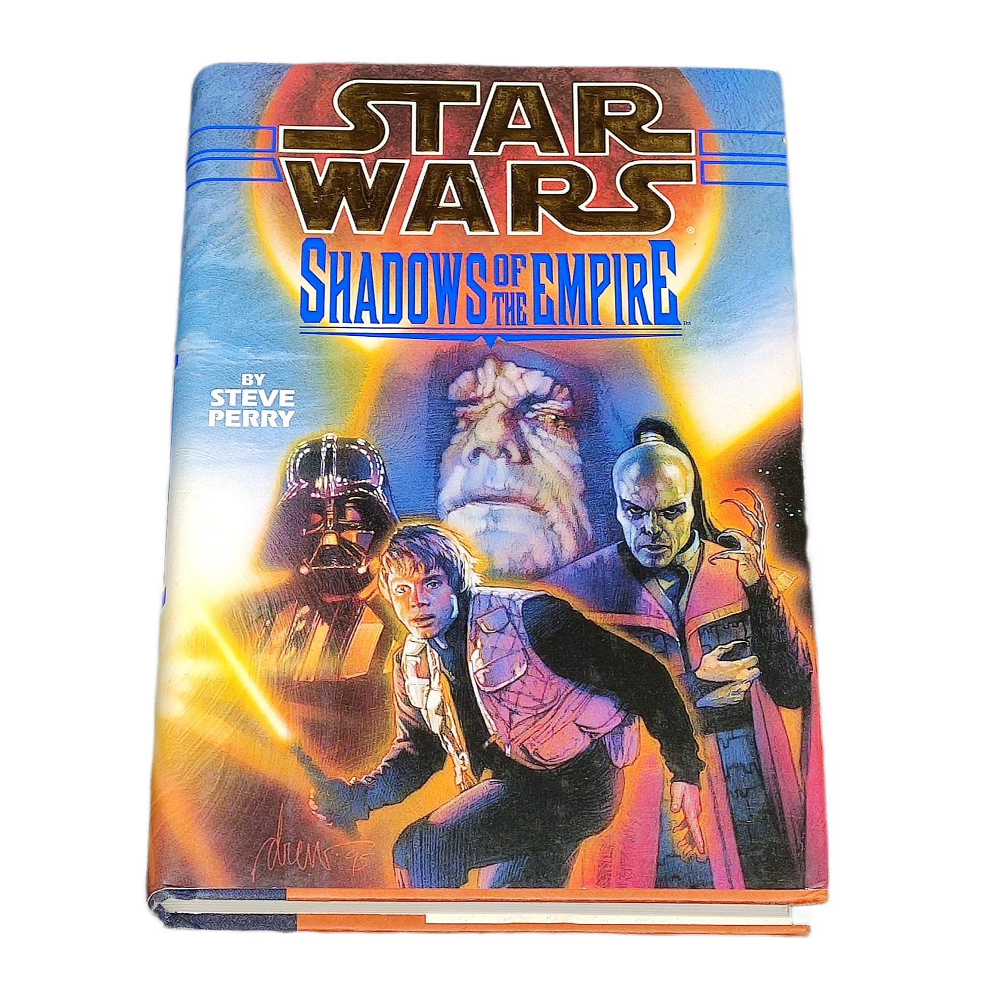 Book titled 'Star Wars: Shadows of the Empire' with characters on the cover