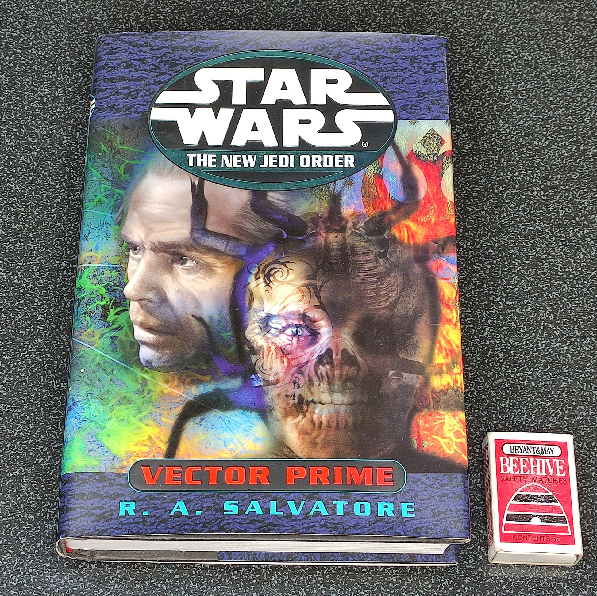Book titled 'Vector Prime' by R.A. Salvatore from 'Star Wars: The New Jedi Order' series on a white background