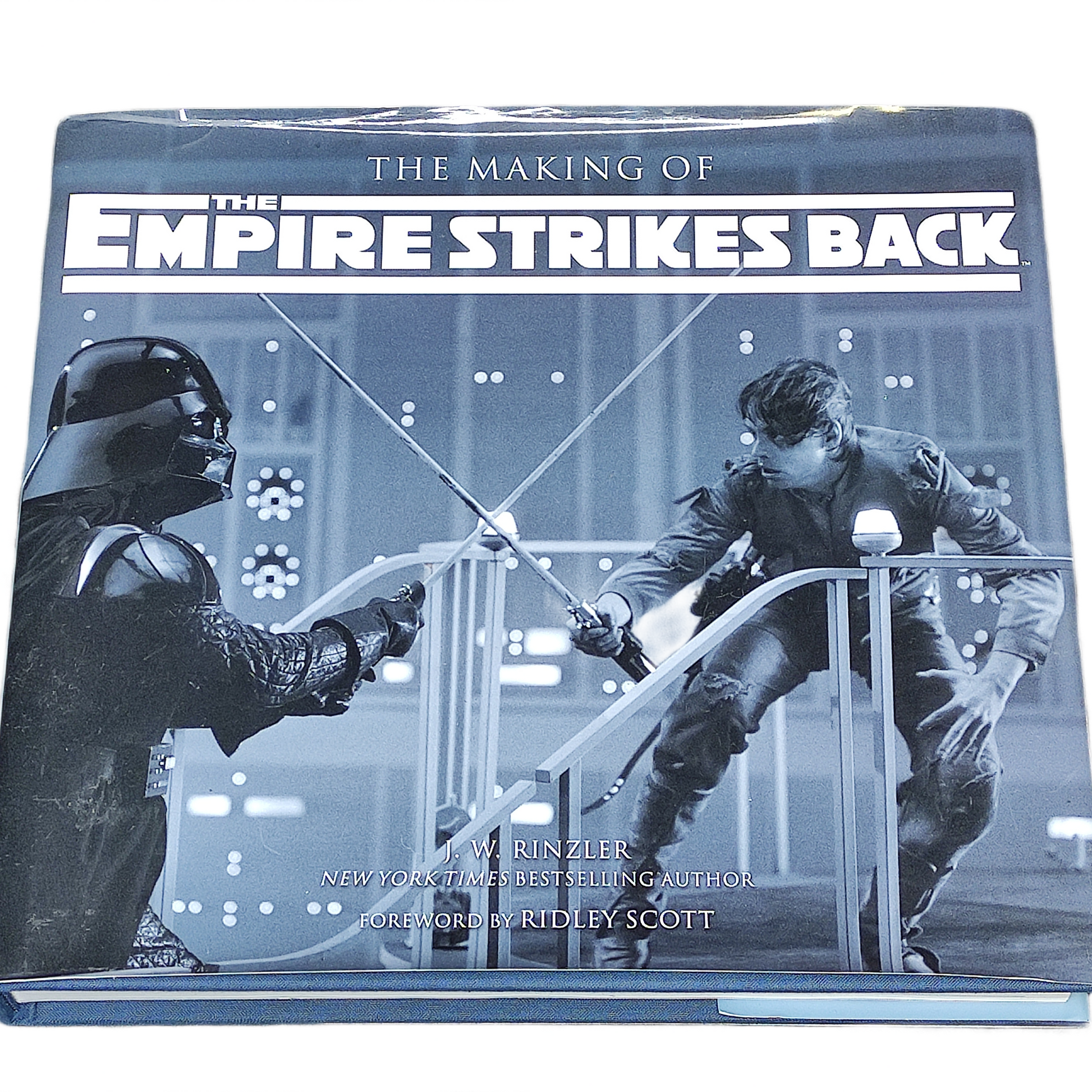 Book titled 'The Making of The Empire Strikes Back' with images of Darth Vader and a character on a white background.