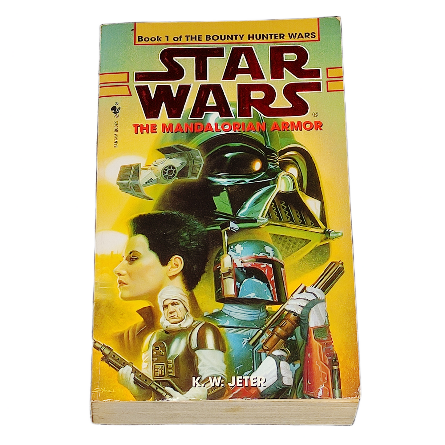 Book cover of 'The Mandalorian Armor' from 'Star Wars' series on a yellow background