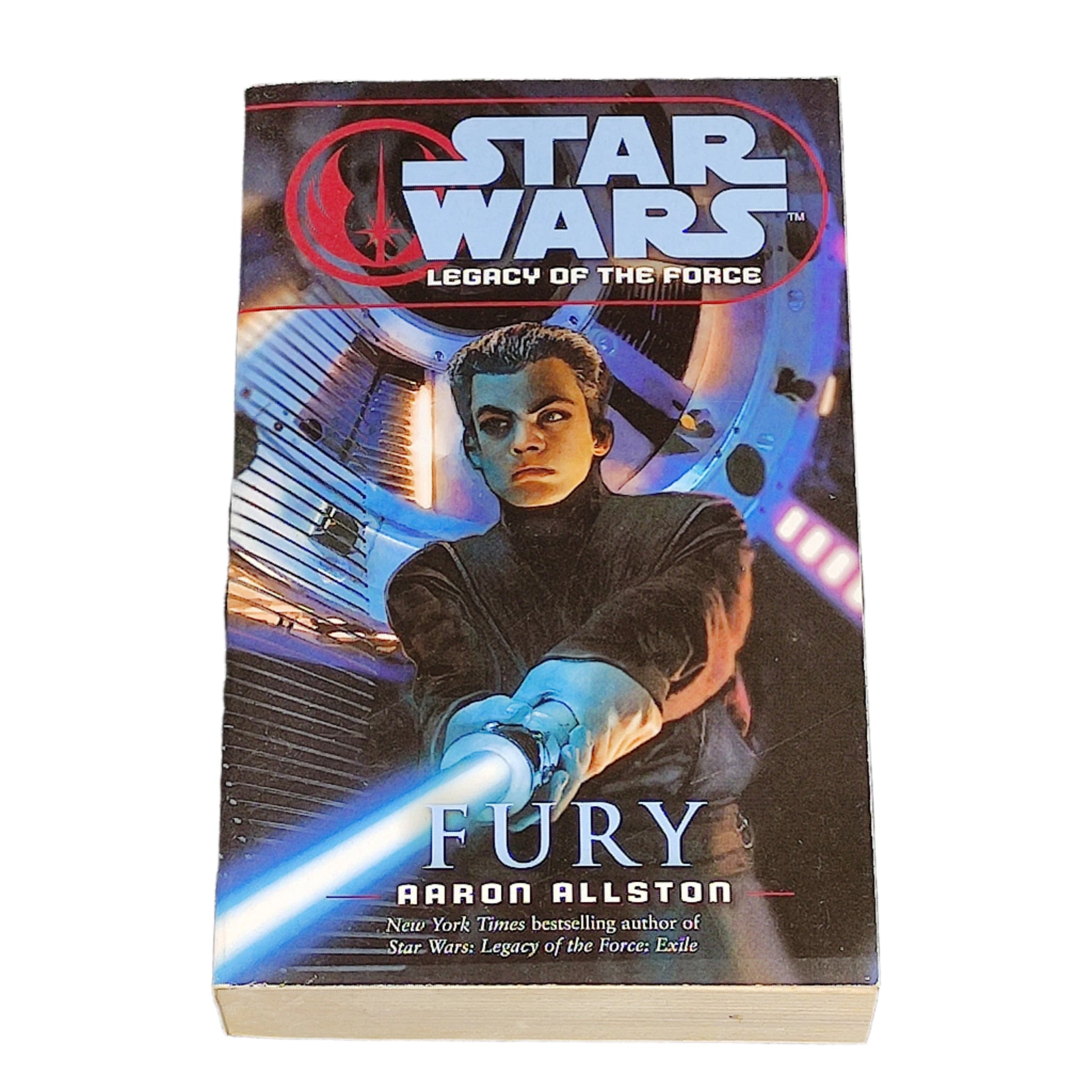 Book titled 'Star Wars: Legacy of the Force Fury' on a white surface