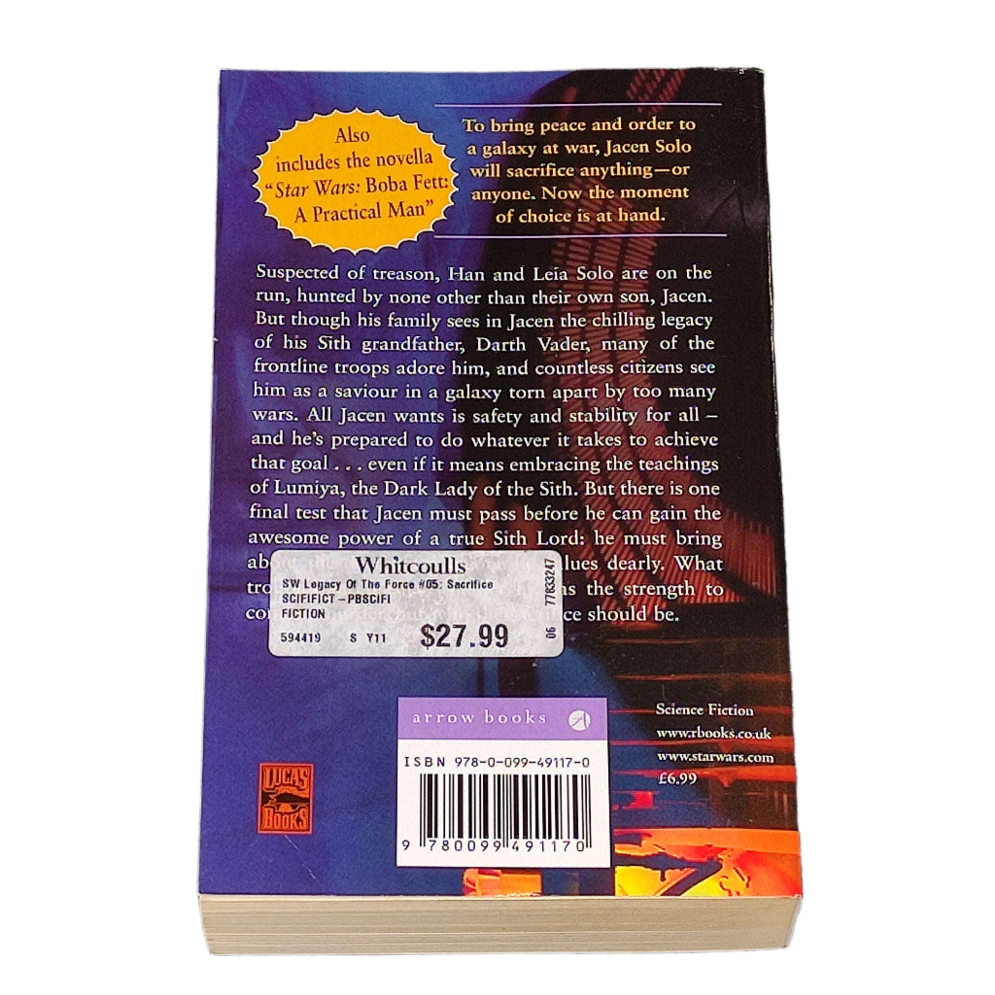 Book titled 'Sacrifice' by Karen Traviss from the Star Wars Legacy of the Force series on a white background