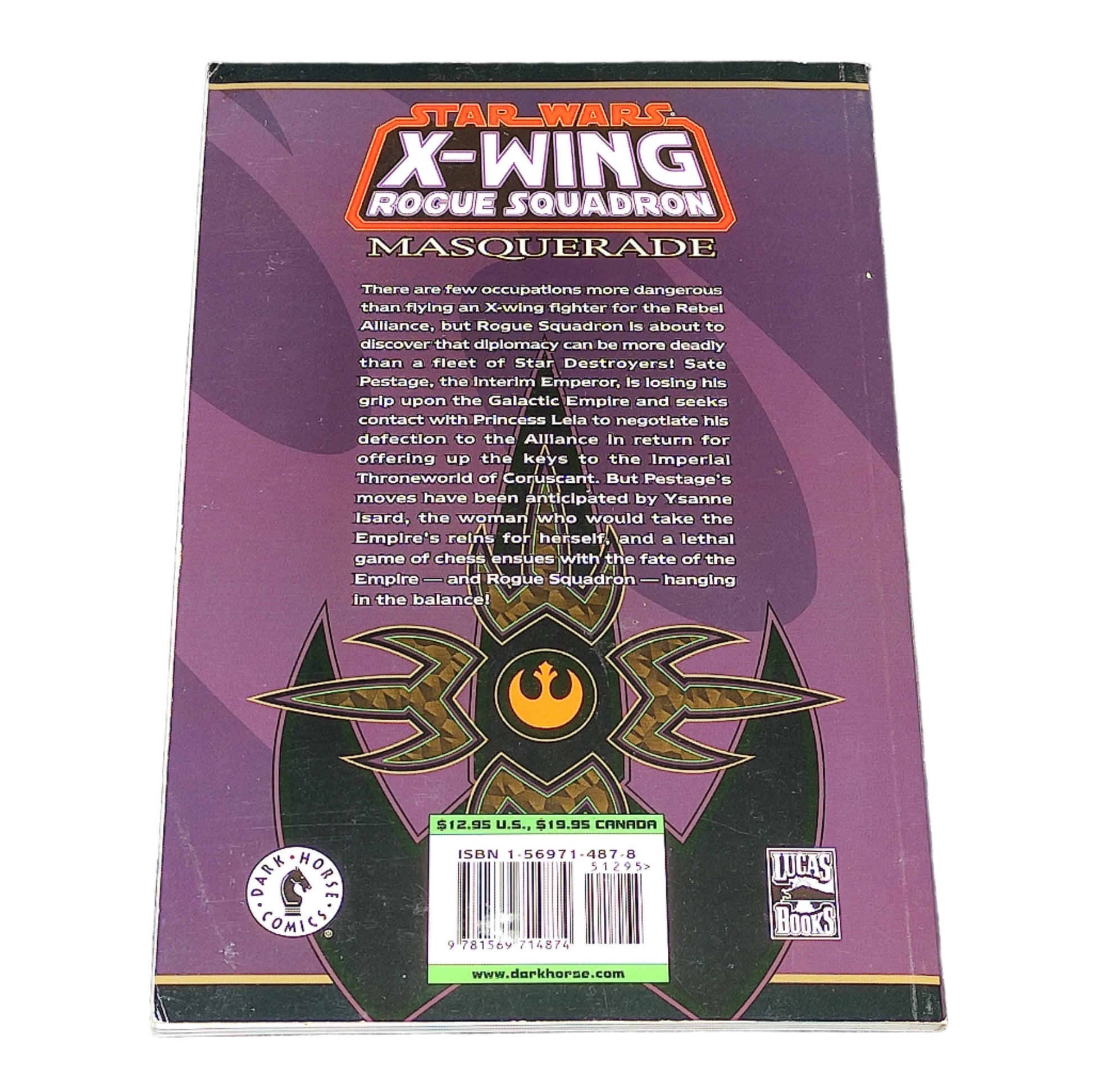 Back cover of 'Star Wars X-Wing Rogue Squadron Masquerade' book on a textured surface