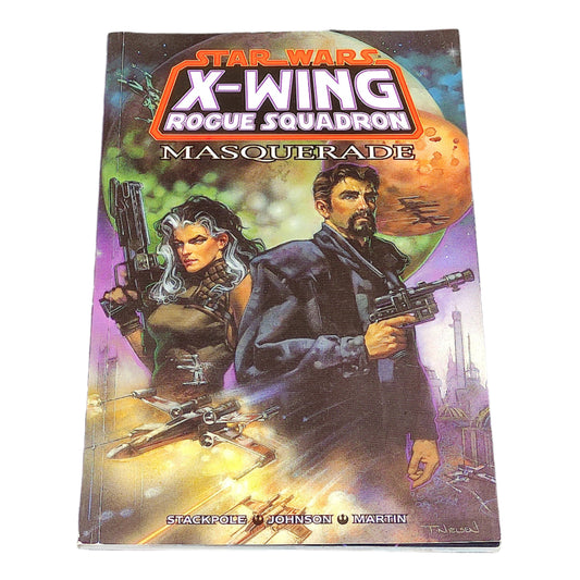 Book cover of 'Star Wars: X-Wing Rogue Squadron Masquerade' on a textured surface