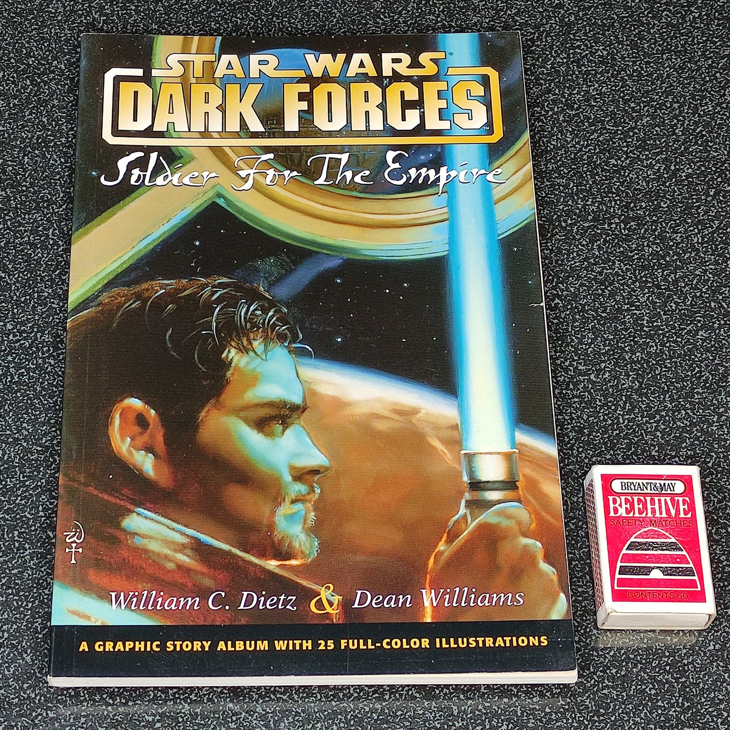 Star Wars 'Dark Forces' book with a matchbox on a textured surface