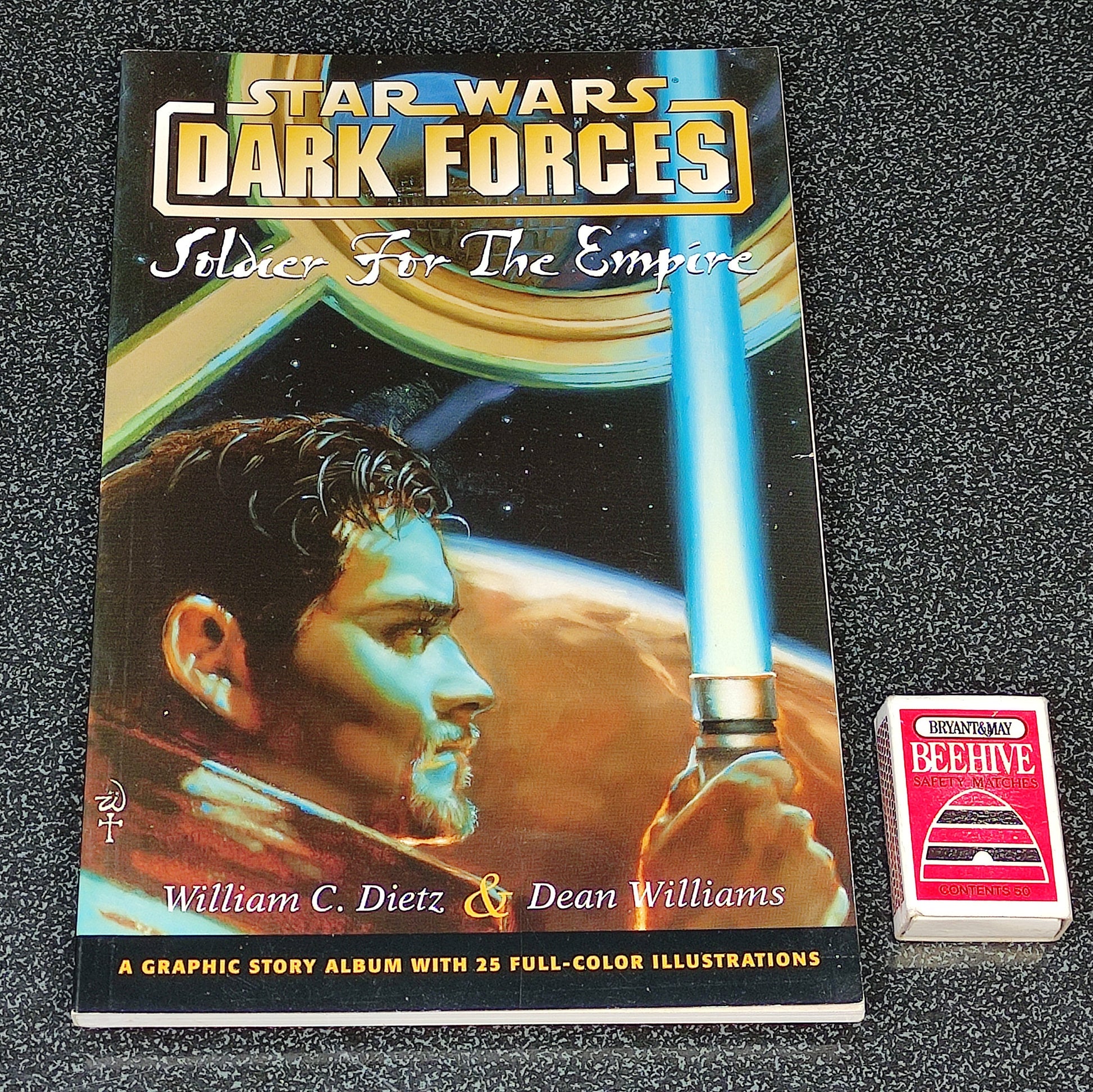 Star Wars 'Dark Forces' book with a matchbox on a textured surface