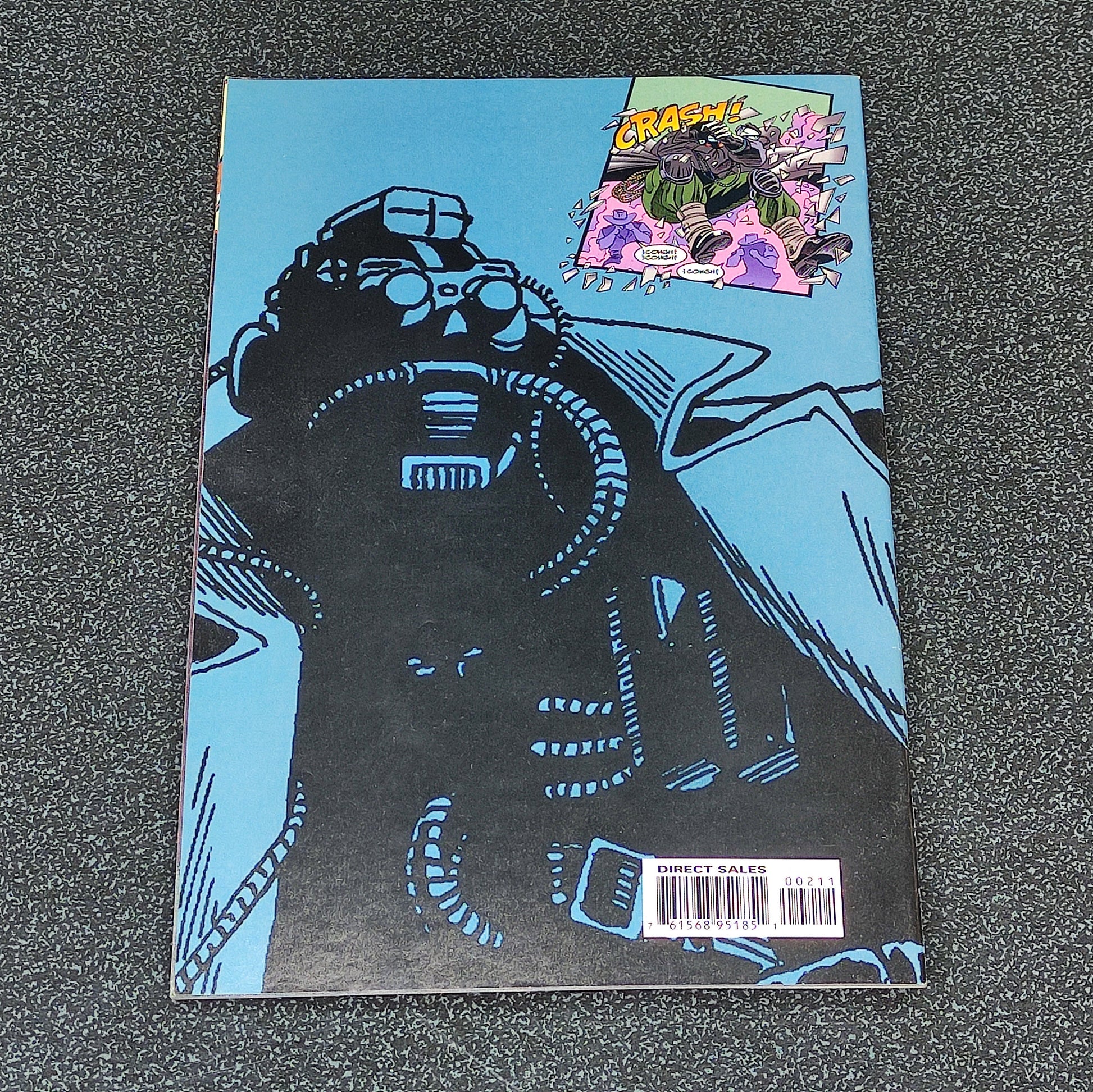 Comic book with a robot illustration on a blue background