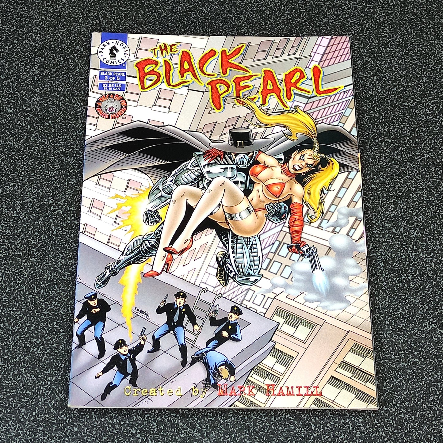 Comic book cover titled 'The Black Pearl' featuring a woman in a dynamic pose.
