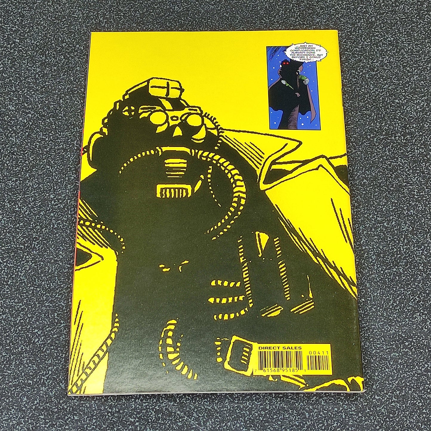 Comic book cover with a robot illustration on a yellow background
