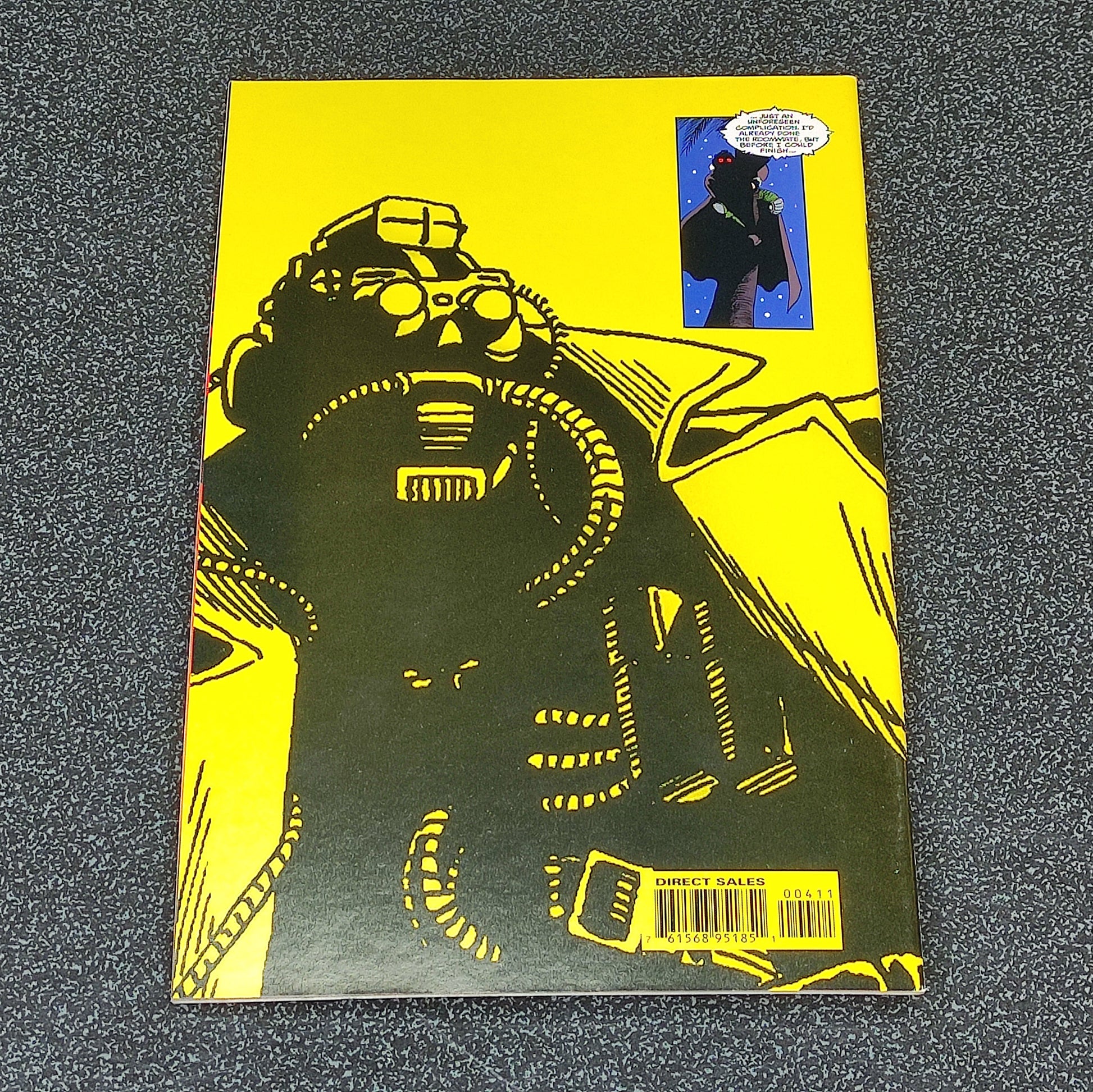 Comic book cover with a robot illustration on a yellow background