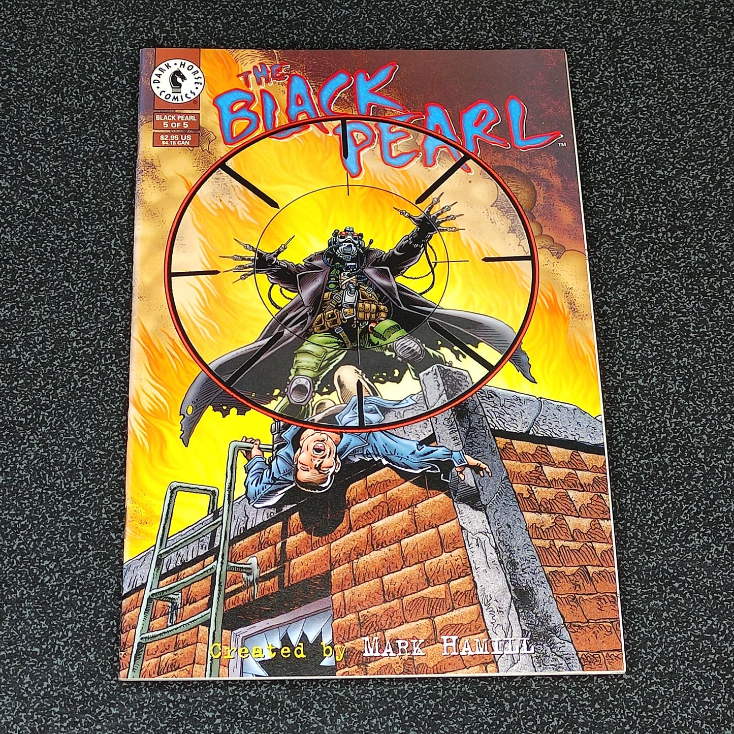 Comic book cover titled 'The Black Pearl' featuring a character on a ladder against a fiery background.