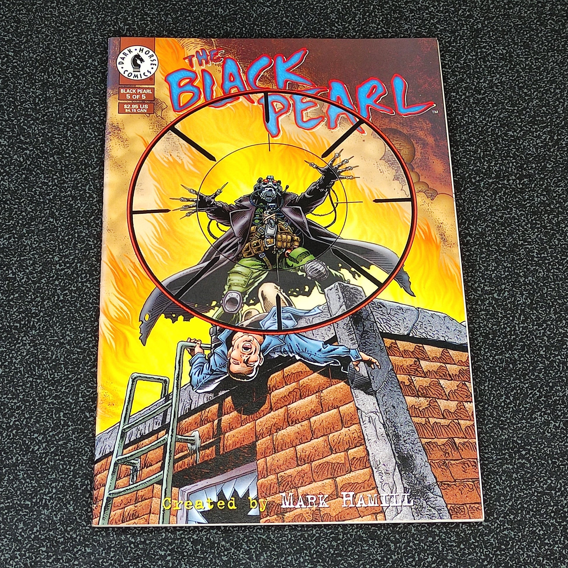 Comic book cover titled 'The Black Pearl' featuring a character on a ladder against a fiery background.