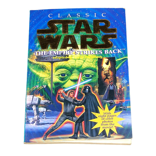 Book cover of 'The Empire Strikes Back' from 'Classic Star Wars' series on a dark textured background