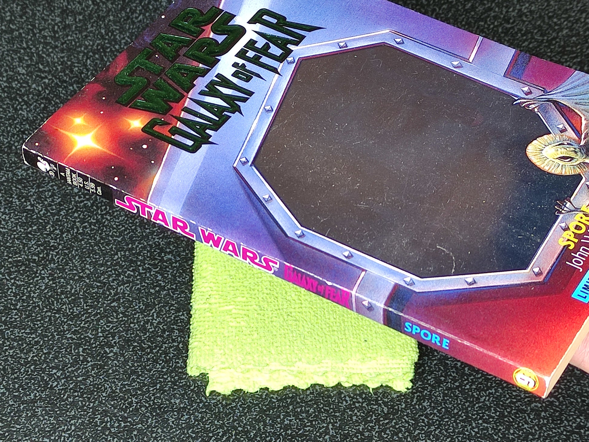 Star Wars 'Quality of Fear' book with a green cloth on a textured surface