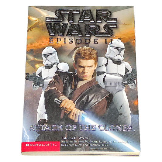 Book titled 'Star Wars Episode II: Attack of the Clones' on a textured black surface