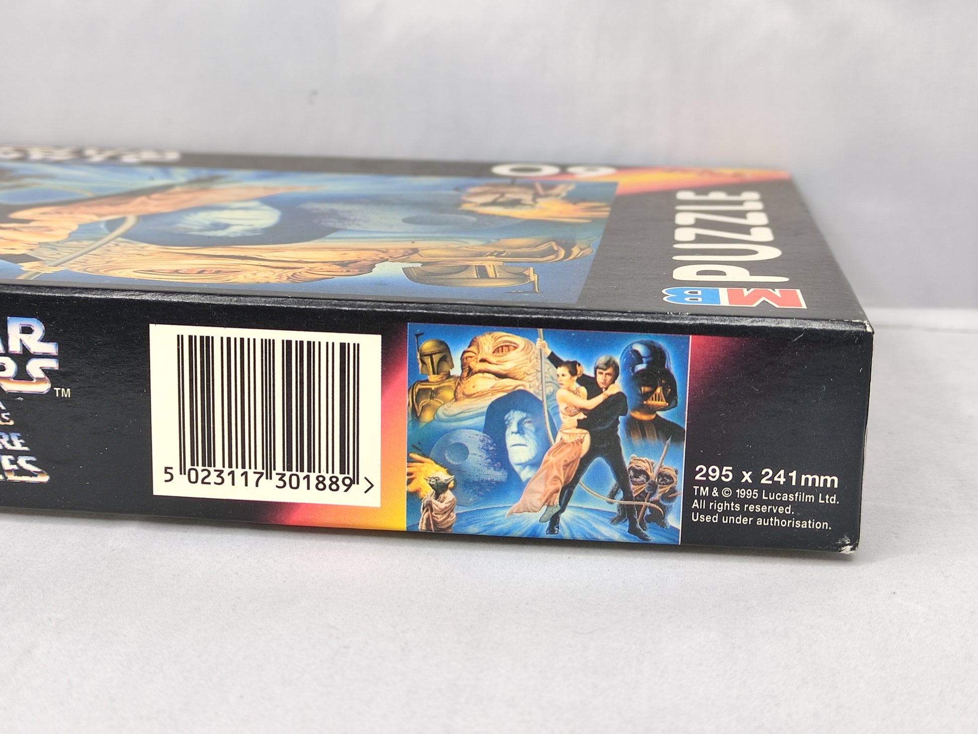 Star Wars puzzle box with characters and branding on a white background