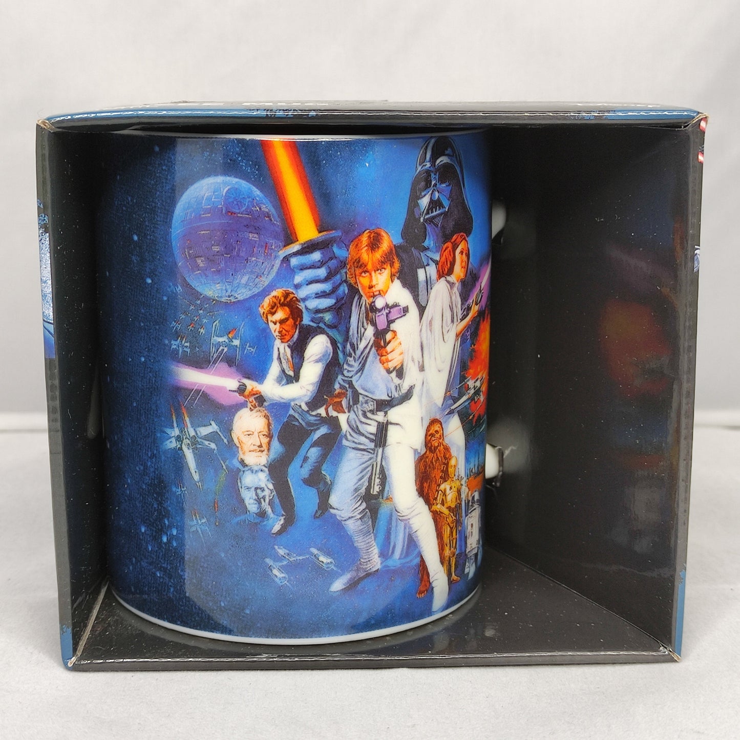 Star Wars-themed mug in a decorative box on a white background