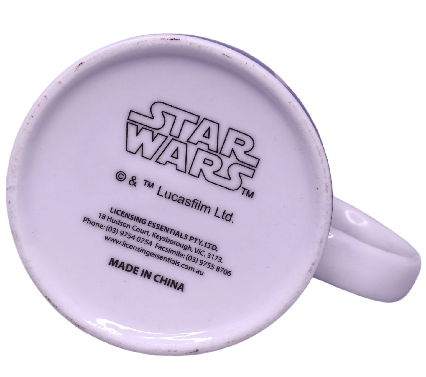 White mug with 'Star Wars' branding on a light gray background