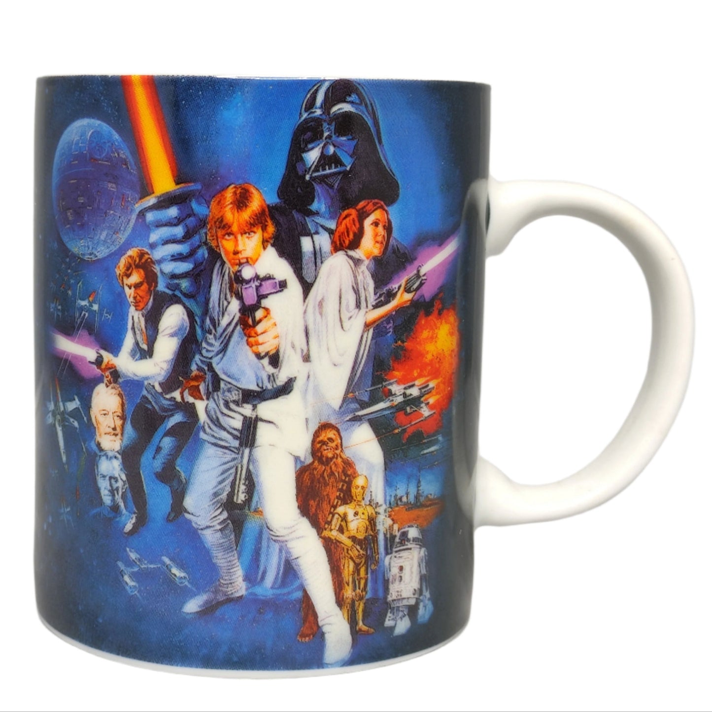 A New Hope Mug with Star Wars-themed design featuring characters and iconic scenes.