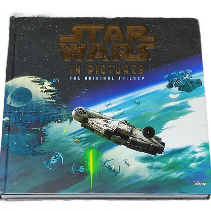Star Wars book titled 'In Pictures: The Original Trilogy' with spaceship illustration on cover