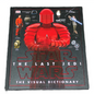 Book titled 'Star Wars: The Last Jedi The Visual Dictionary' with a red character on the cover.