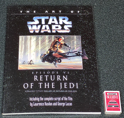 Book titled 'The Art of Star Wars Episode VI: Return of the Jedi' on a dark surface