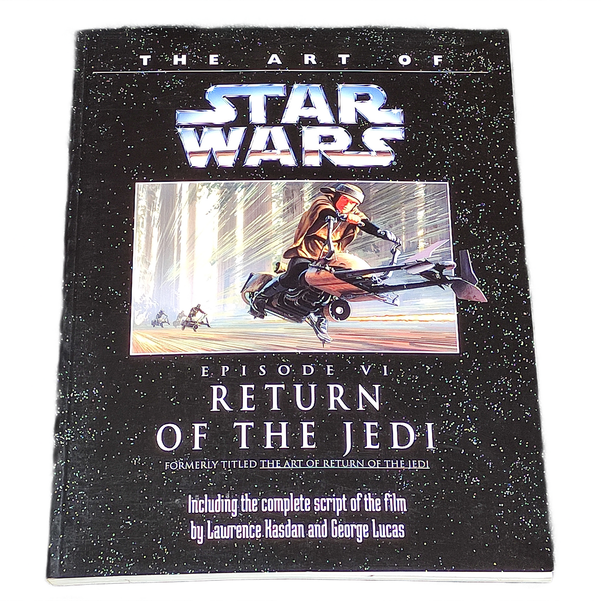 Book cover of 'The Art of Star Wars: Episode VI Return of the Jedi' with a character on a speeder bike.