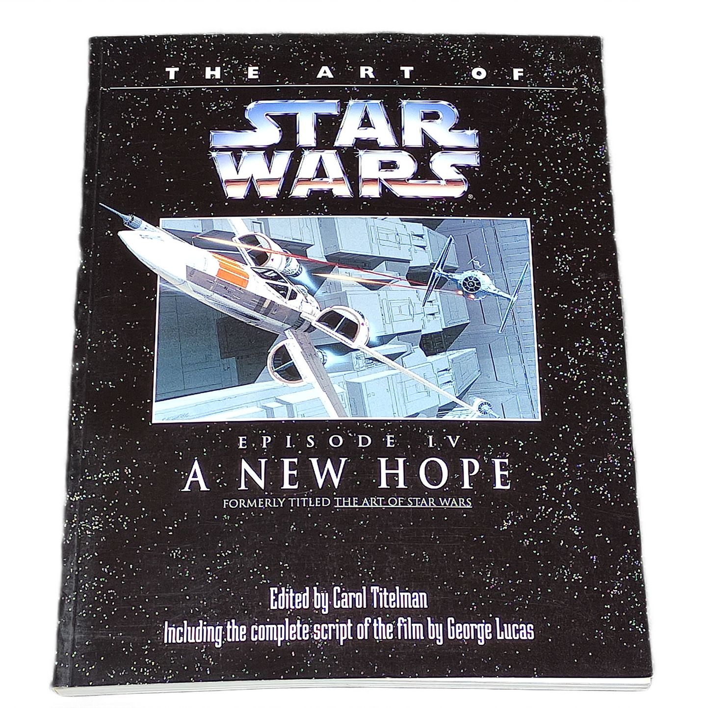 Book cover of 'The Art of Star Wars Episode IV: A New Hope' with a spaceship illustration on a black background.