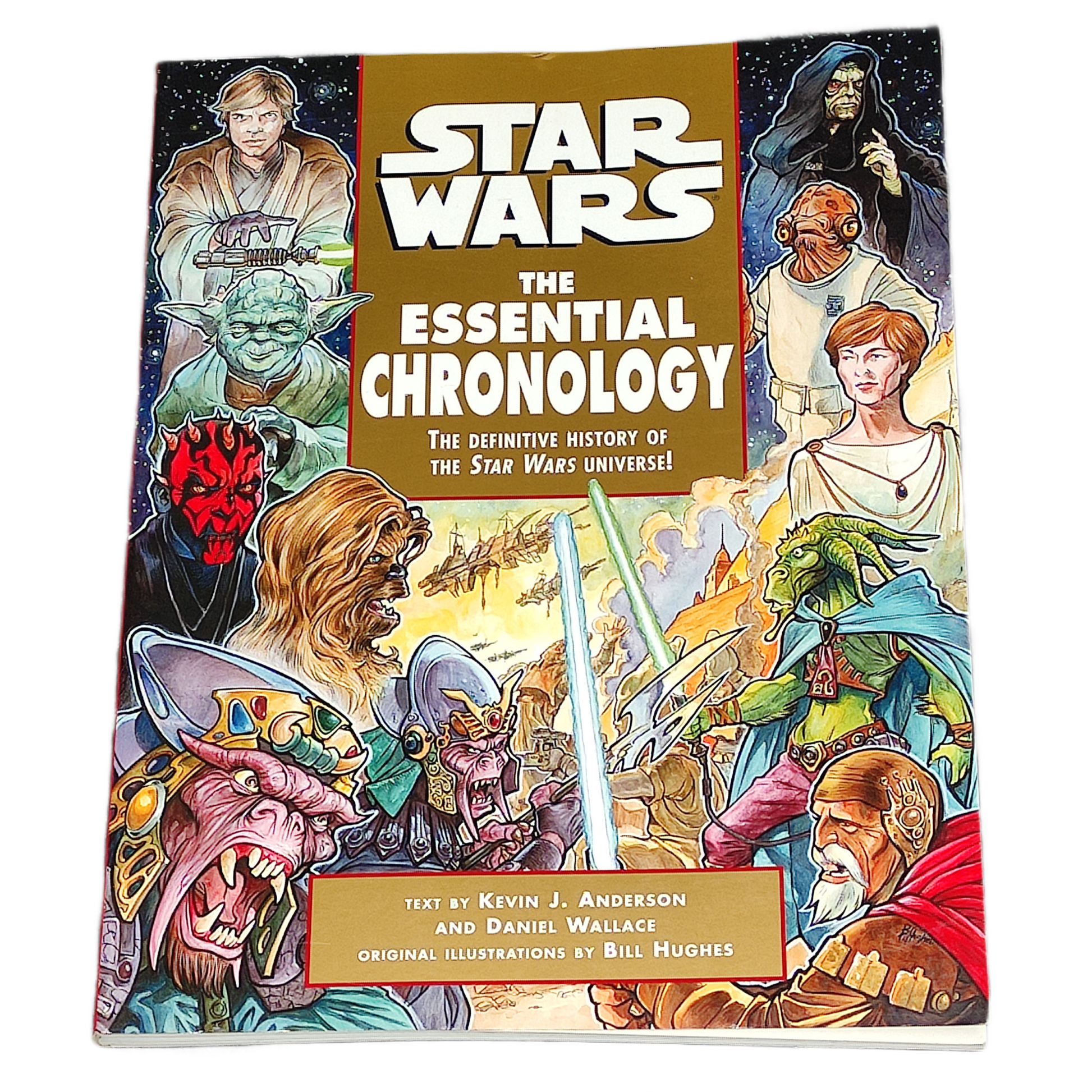 Book titled 'Star Wars: The Essential Chronology' with colorful illustrations on the cover.