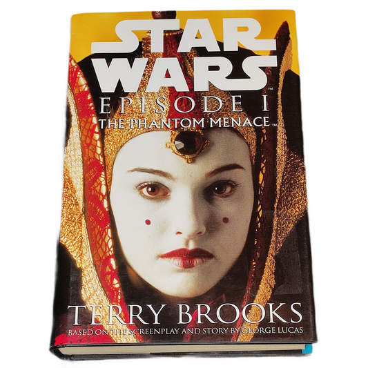 Book cover of 'Star Wars Episode I: The Phantom Menace' by Terry Brooks with a character's face on the cover.