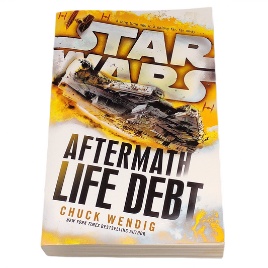 Book titled 'Aftermath: Life Debt' by Chuck Wendig with a Star Wars logo on the cover.