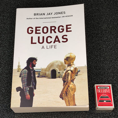 Book titled 'George Lucas: A Life' by Brian Jay Jones on a dark textured surface