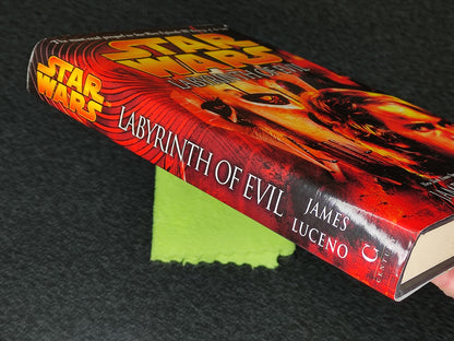 Book titled 'Labyrinth of Evil' by James Luceno with a Star Wars cover design.
