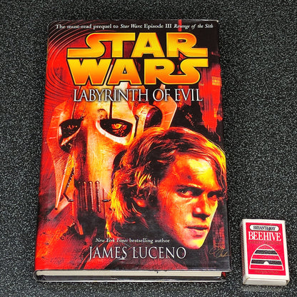 Book titled 'Labyrinth of Evil' by James Luceno with a Star Wars cover design.