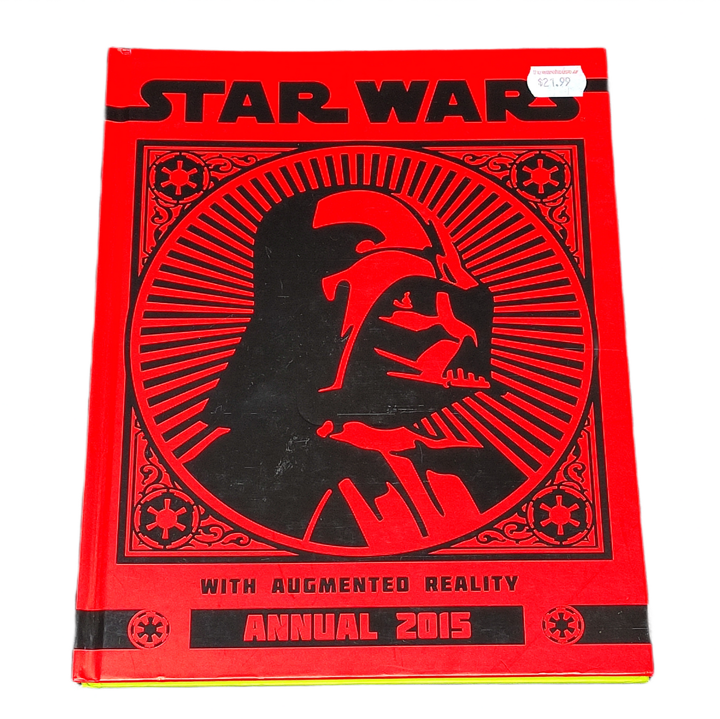 Red and black 'Star Wars' annual book with Darth Vader silhouette on a white background