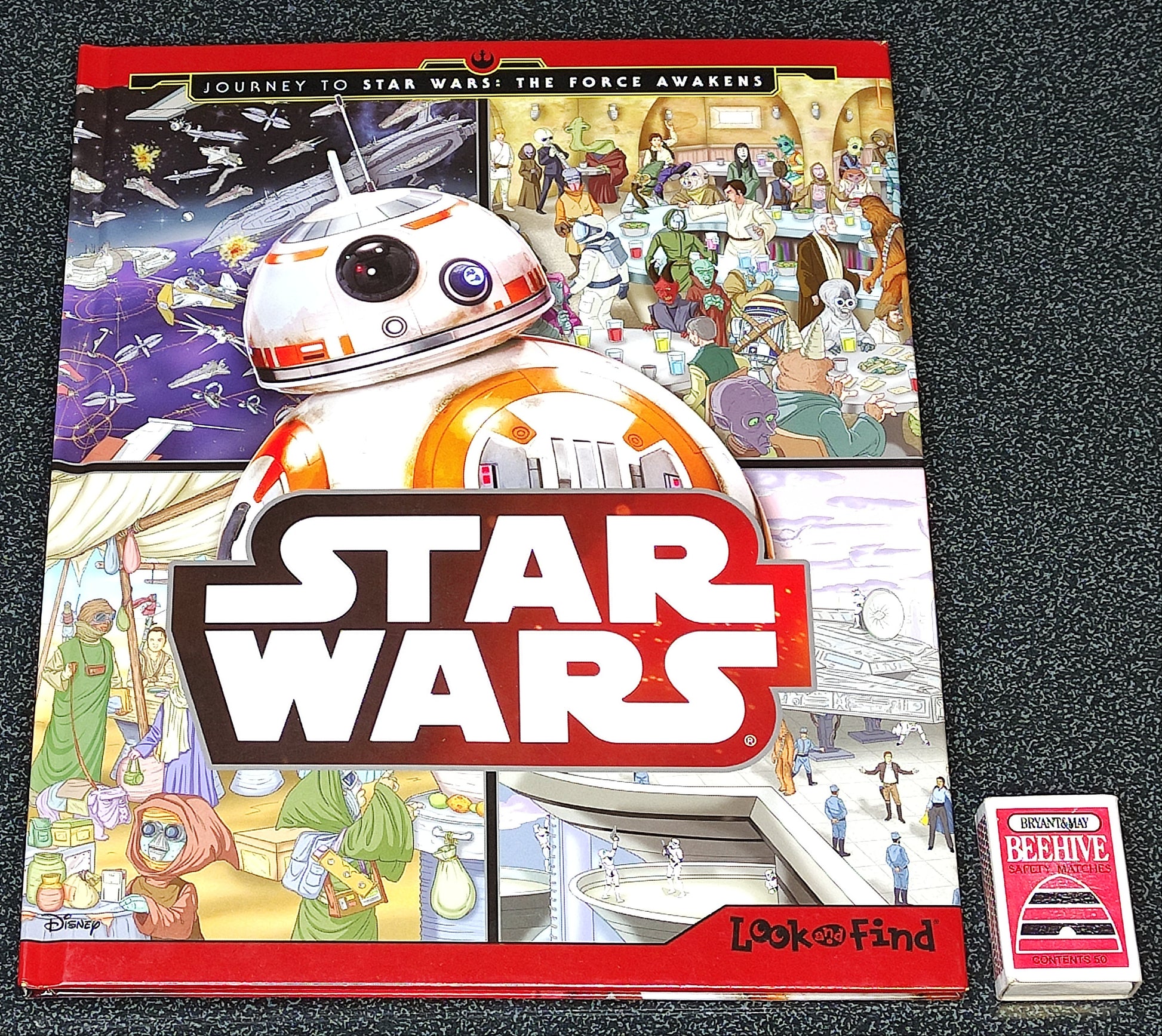 Star Wars themed book with BB-8 droid illustration on a dark textured background