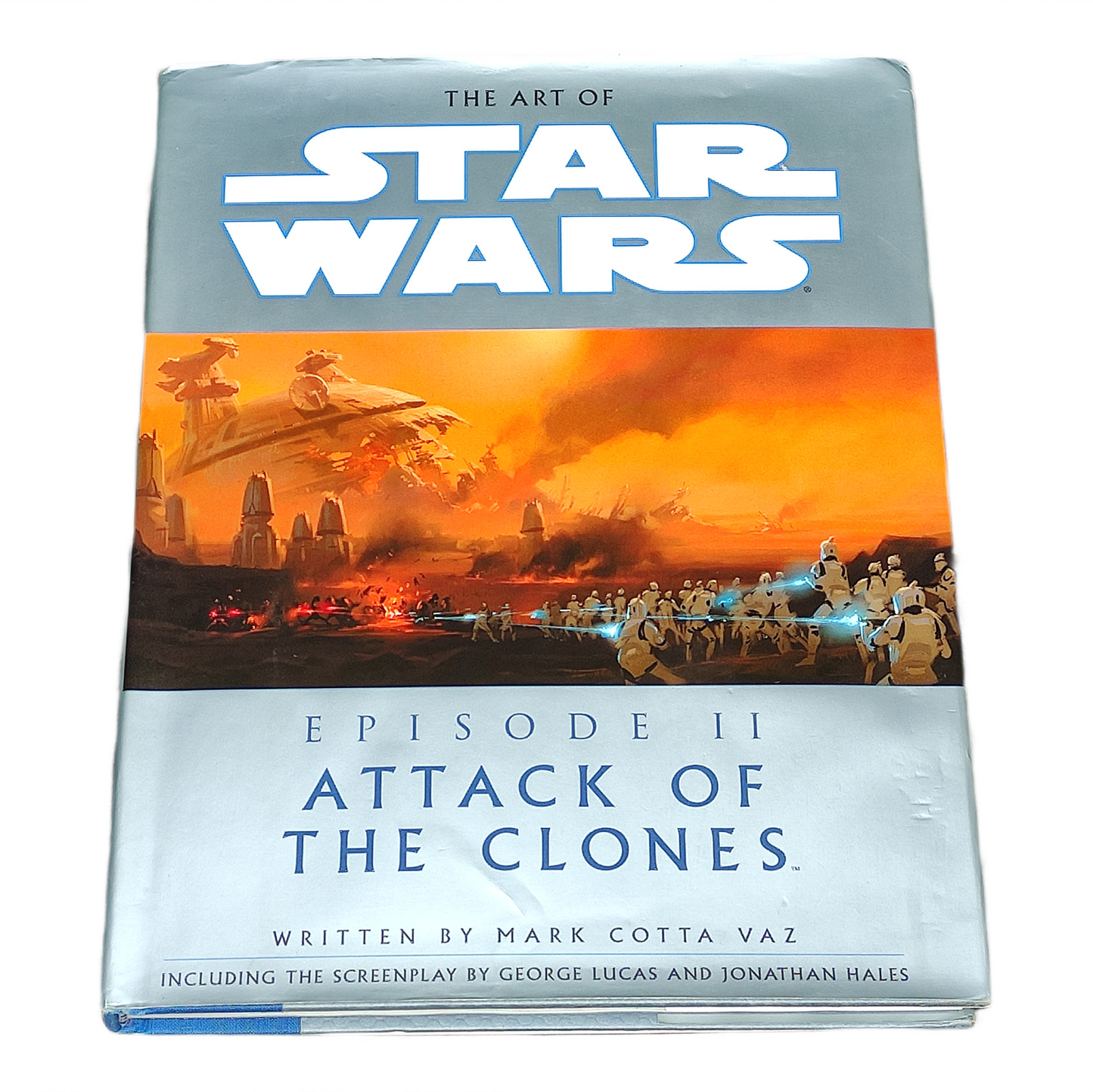 Book titled 'The Art of Star Wars: Episode II Attack of the Clones' on a white background