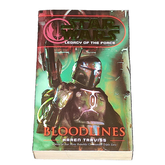 Book cover of 'Bloodlines' by Karen Traviss on a white surface