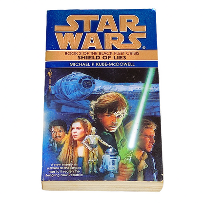 Book cover of 'Star Wars' with characters and spaceship on a blue and gold background