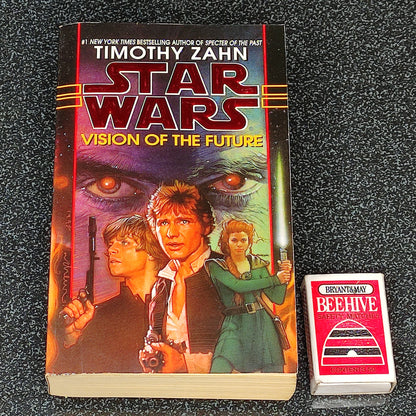 Book titled 'Star Wars: Vision of the Future' by Timothy Zahn on a dark textured surface