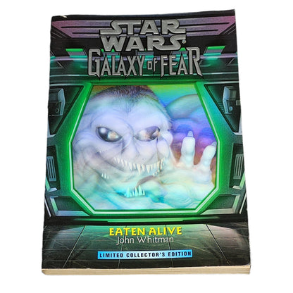 Book titled 'Star Wars: Galaxy of Fear - Eaten Alive' by John Whitman on a dark textured background