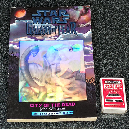 Star Wars themed book titled 'City of the Dead' by John Whitman on a textured black surface.